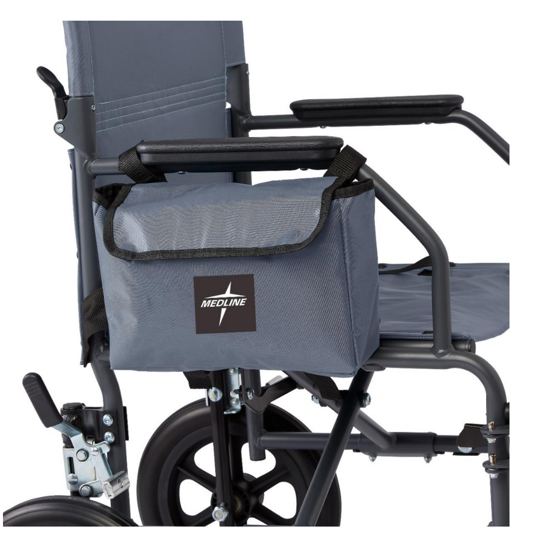 A close-up of a gray wheelchair with the Medline Side Bag for Transport Chairs & Wheelchairs, made from water-resistant nylon, attached to the armrest; part of the seat, wheels, and handles are visible.